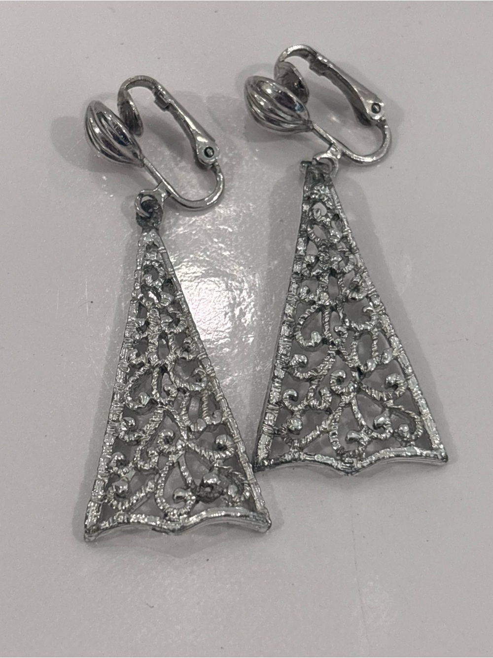 Vintage Sarah Coventry silver-tone filigree dangle clip on earrings-signed